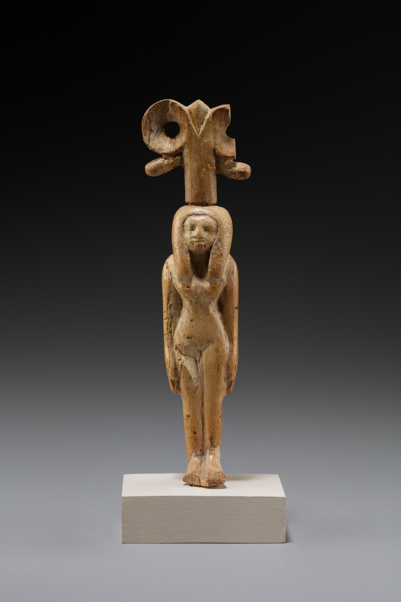 A small ivory figure the Metropolitan Museum of Art titles Goddess of Lower Egypt.