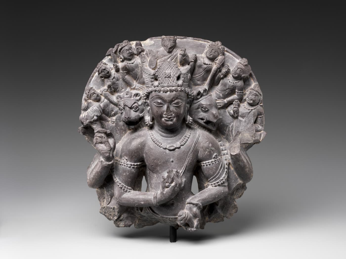A stone sculpture of Vishvarupa Vishnu from the Metropolitan Museum of Art.