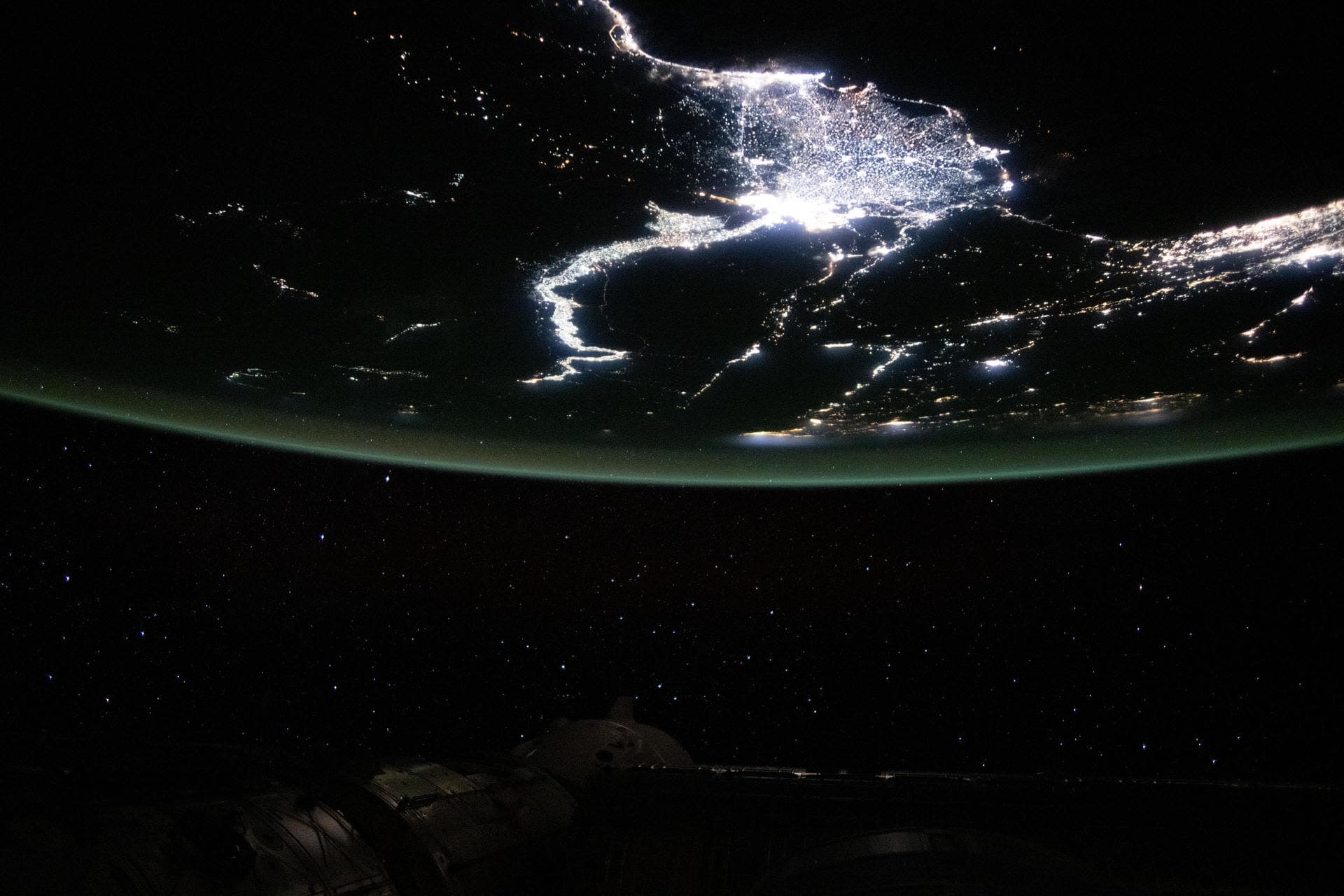 The Nile Delta at night, seen from the International Space Station, with city lights along the river.