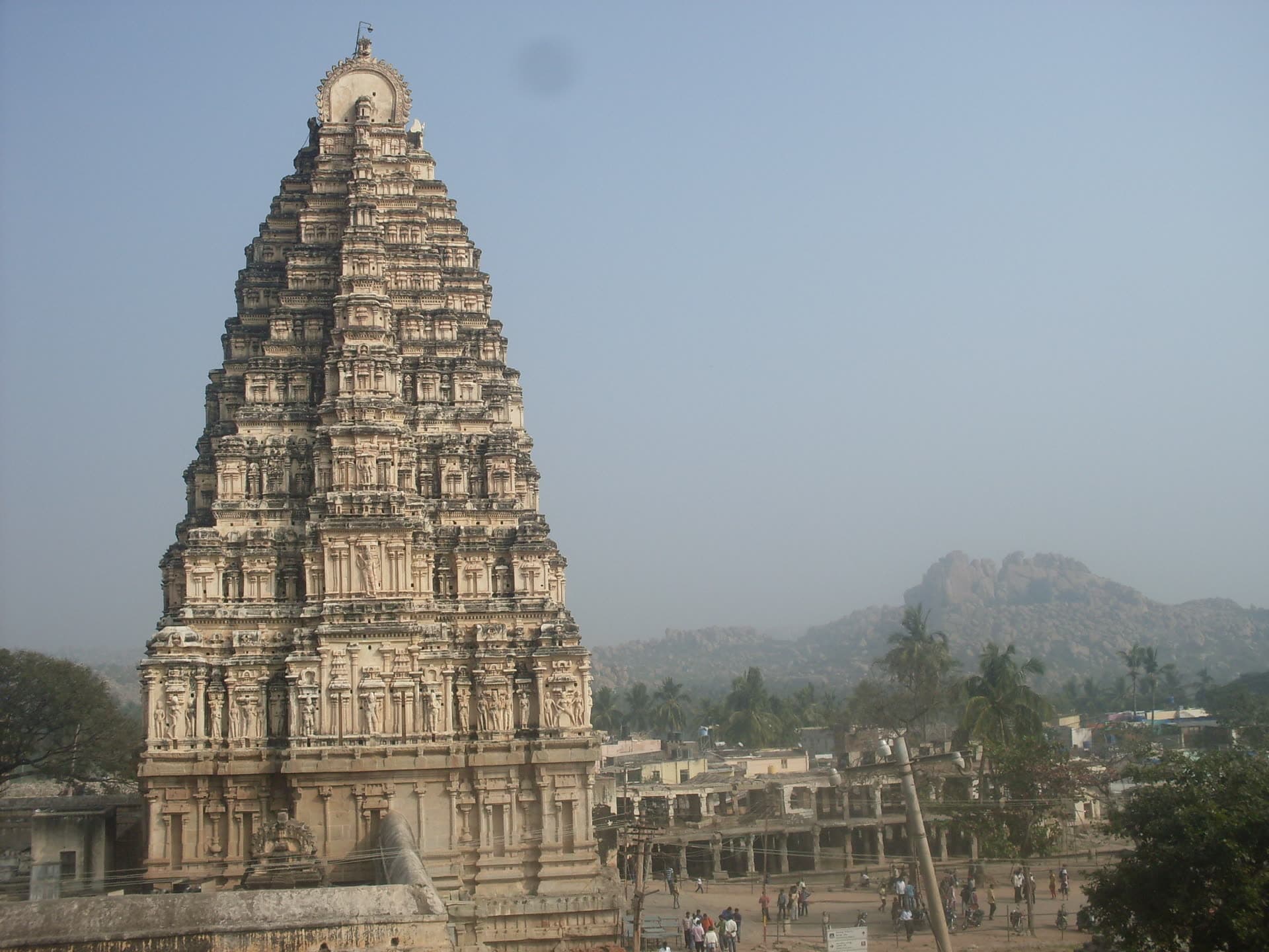 The Virupaksha temple at Hampi, seen from a rocky rise.