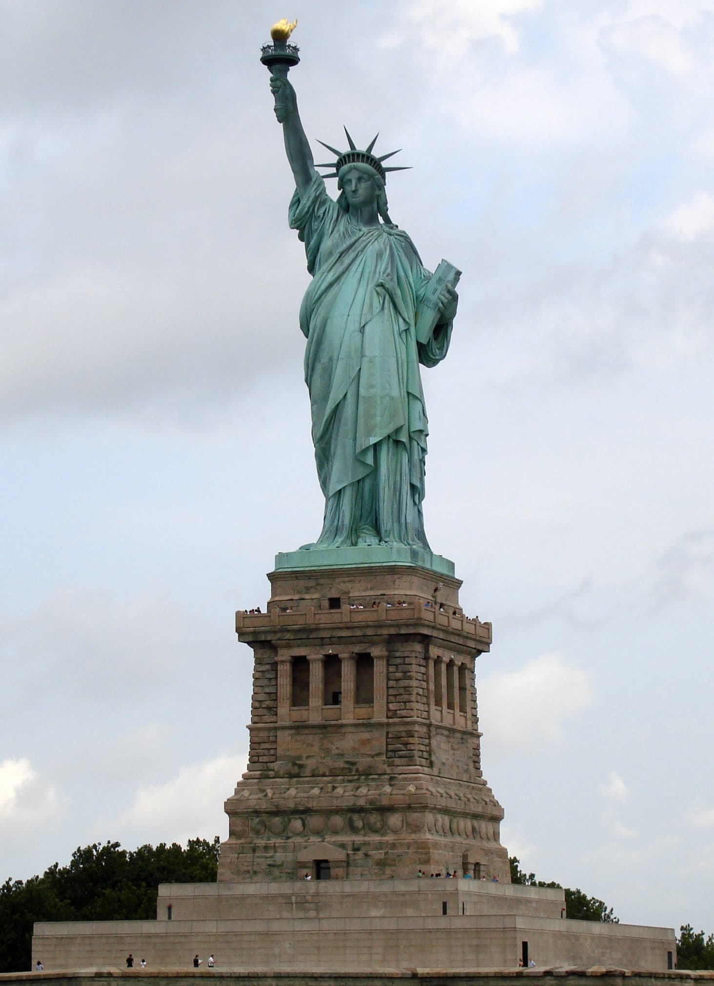 The Statue of Liberty, seen against the sky.
